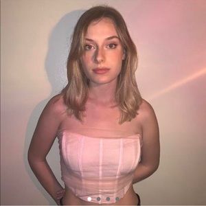 Lovely White Fox boutique bustier/corset with pink tool!